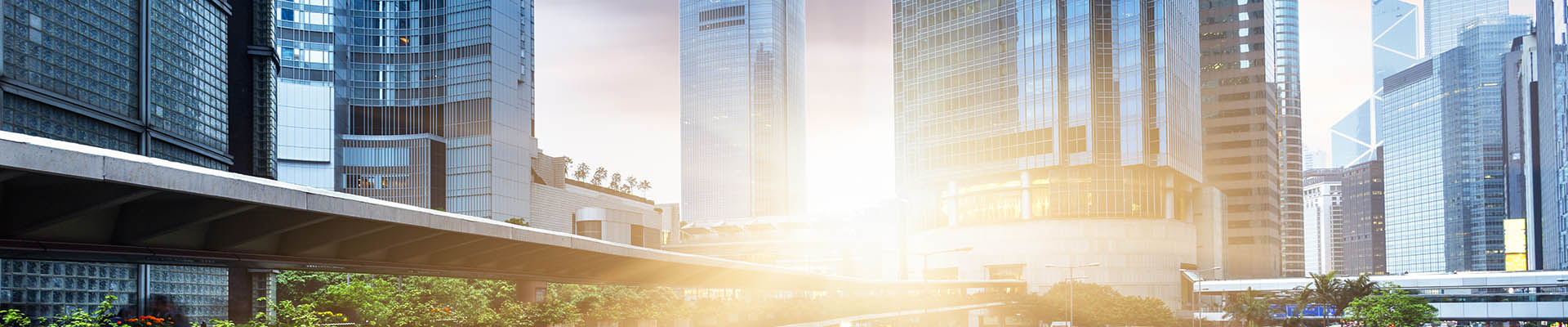 Picture of a skyline with the sun shining through