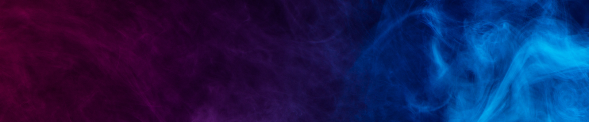 Blue and red smoke against a black background