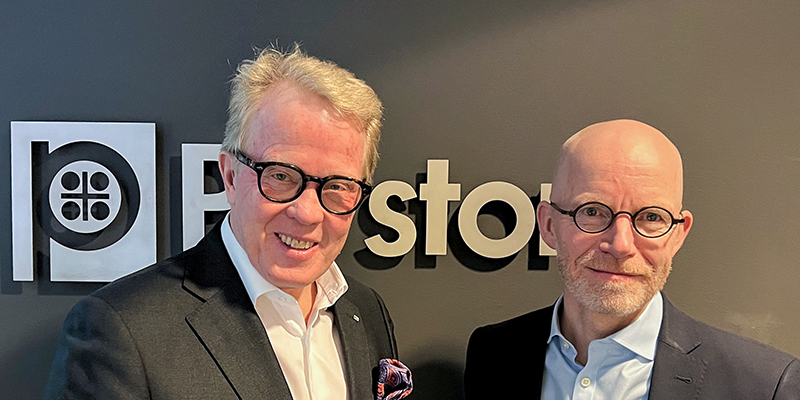 Jan Secher and Ib Jensen in front of Perstorp Logo