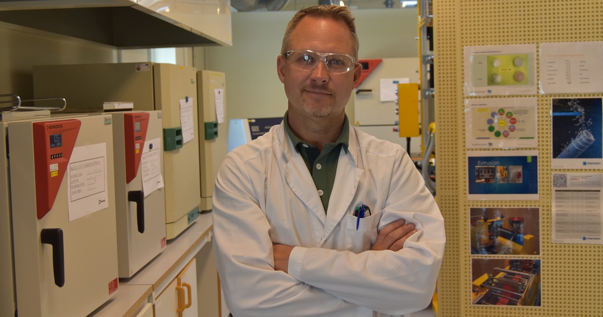 Perstorp employ Magnus Kokko standing in a laboratory