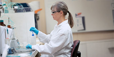 A Perstorp employee in the lab