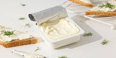 Plastic jar with cheese