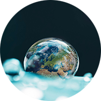Pro Environment Solutions theme image Water drop with a reflection of the earth in it